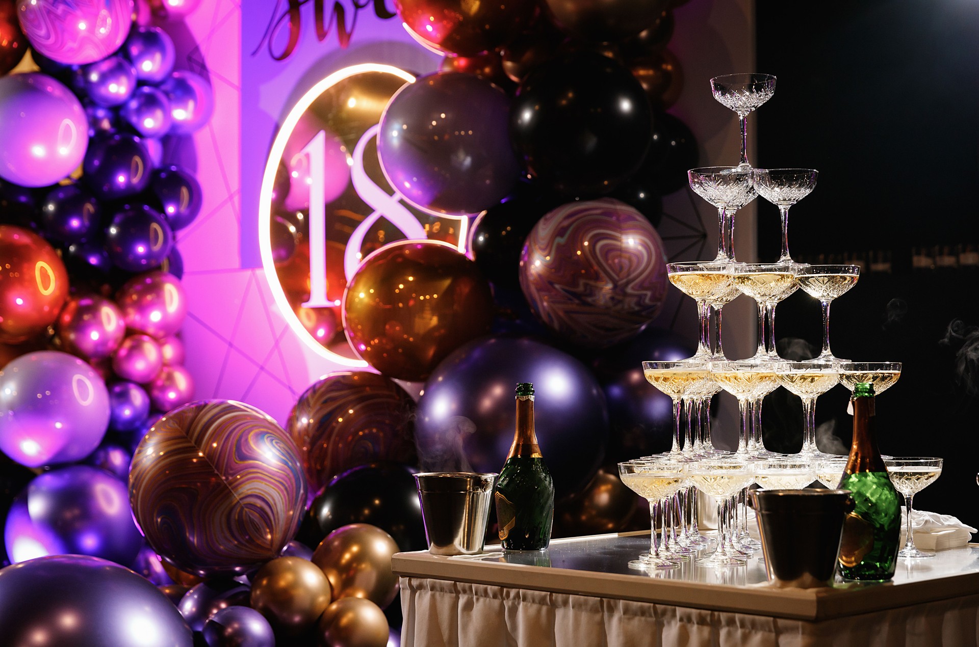 Glasses slide with champagne on Holiday, Birthday, party in restaurant